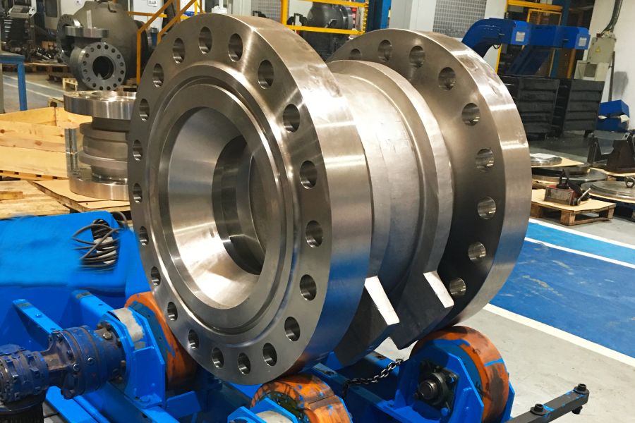 Axial flow valve body machining