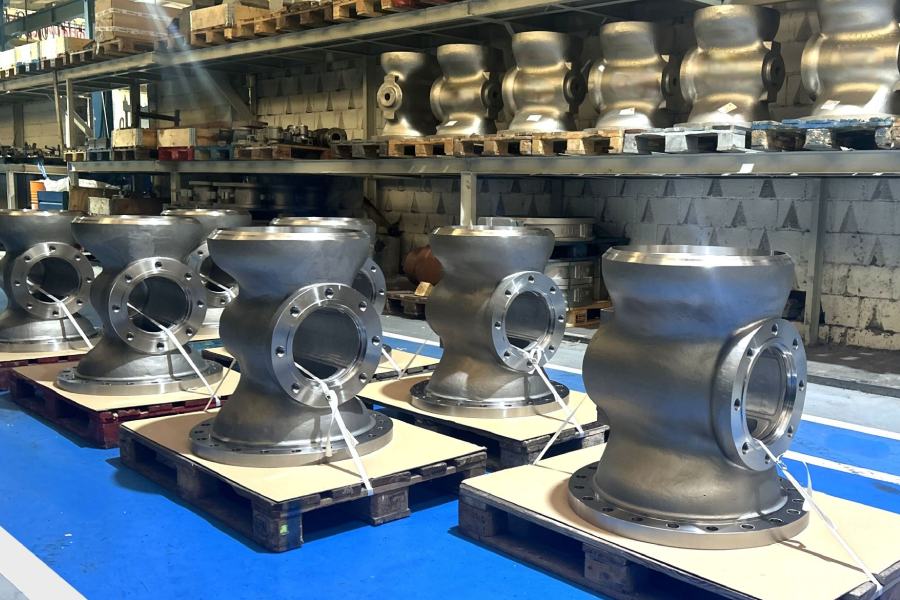 Industrial valve bodies machined in stainless steel prepared for inspection and shipment at the Asimer Group facilities.
