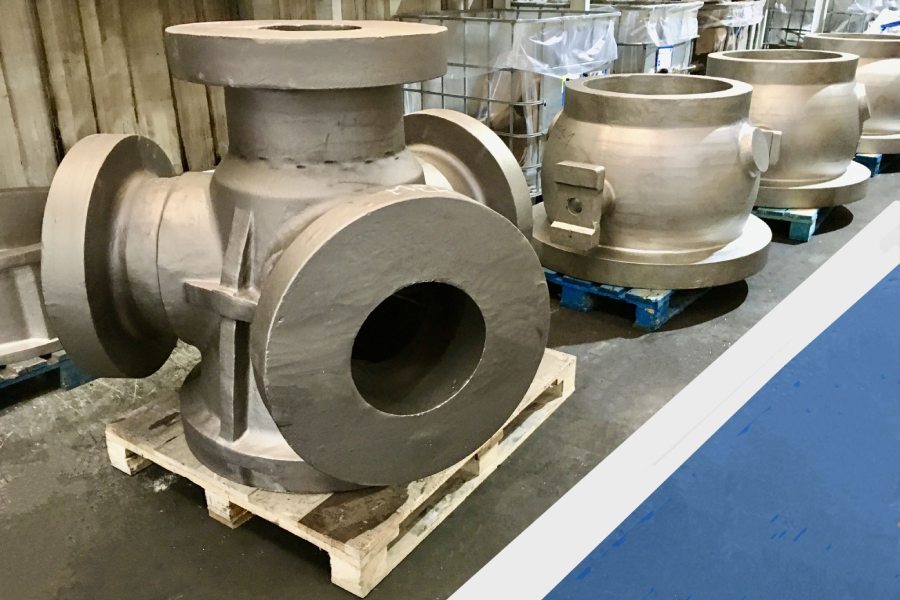 Switch plug valve bodies in the rough, before pre-machining and datum definition.